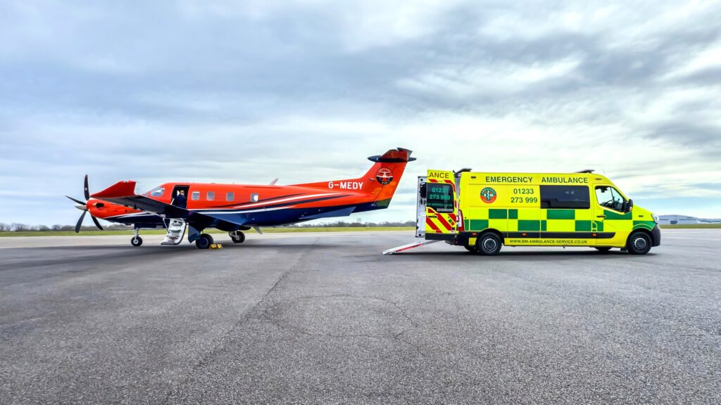 SkyCare air ambulance G-MEDY on runway with open door