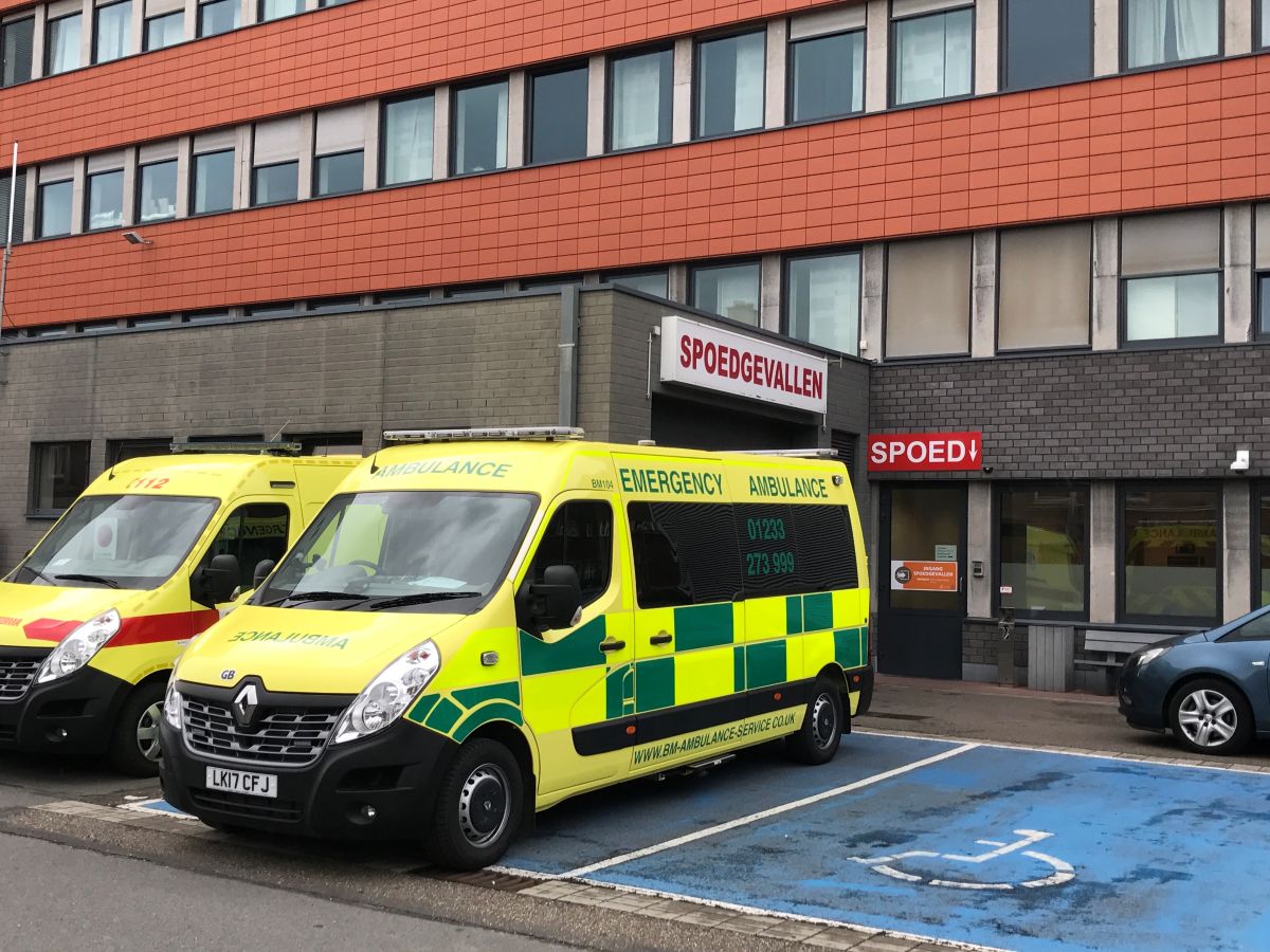 ICU road ambulance collecting injured rider from hospital near Nürburgring for repatriation to the UK