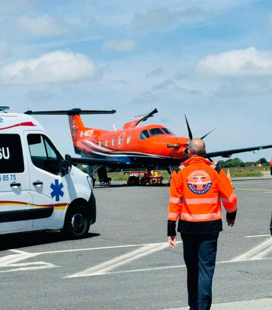 SkyCare air ambulance on the tarmac at Budapest Ferenc Liszt Airport during medical repatriation