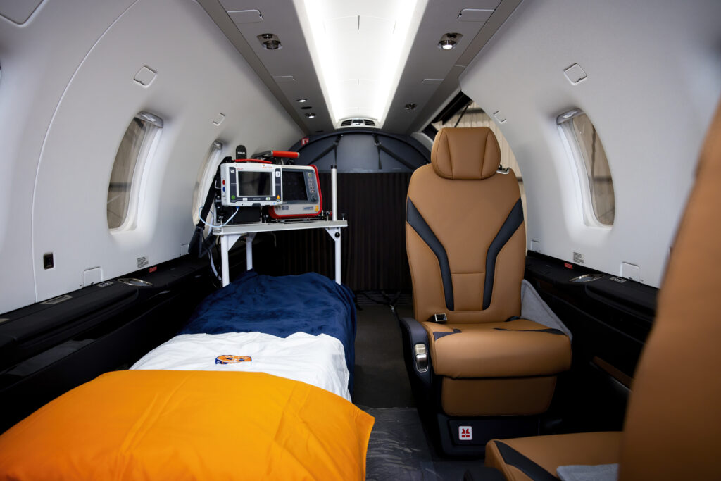 Fully equipped SkyCare stretcher and intensive care medical equipment for air ambulance flights from Spain.