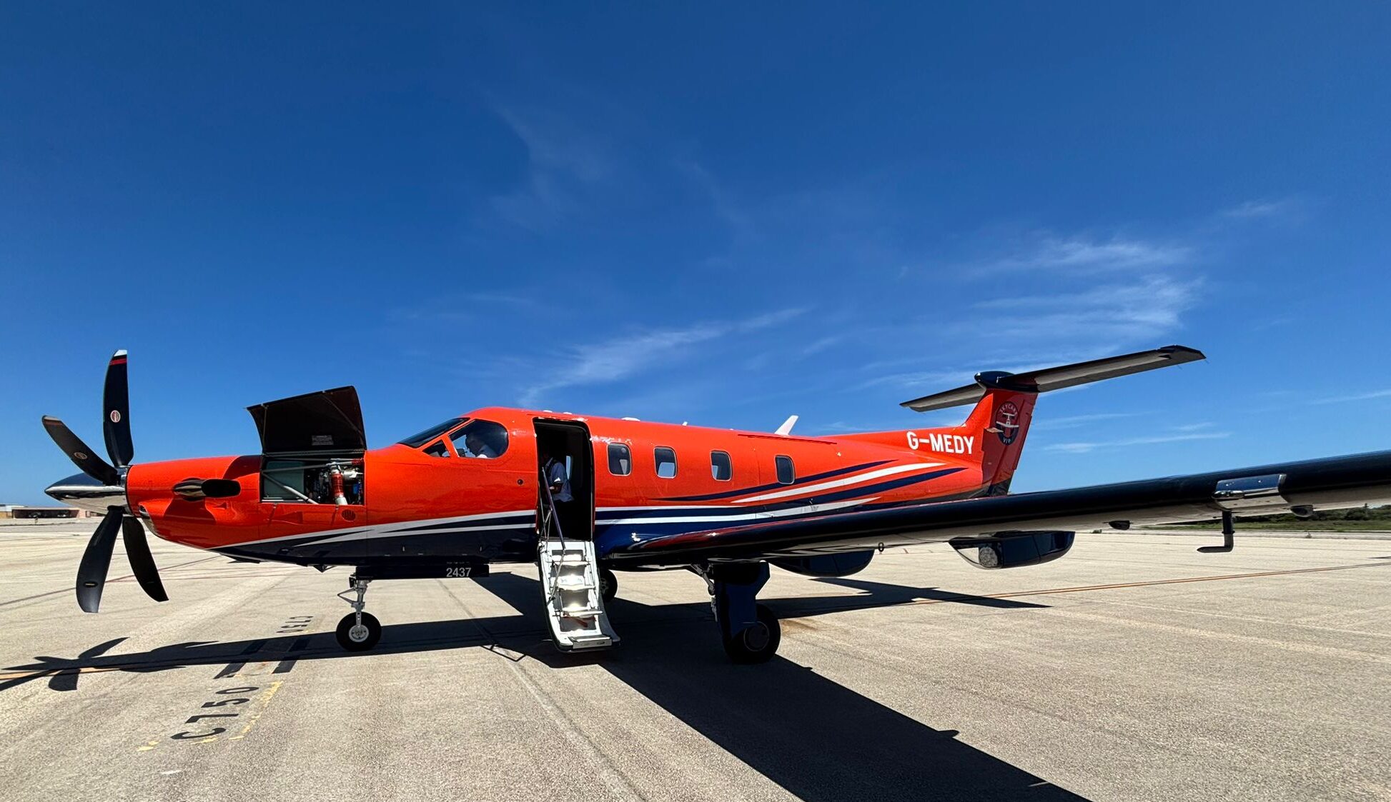 SkyCare air ambulance aircraft on the ground preparing for medical repatriation