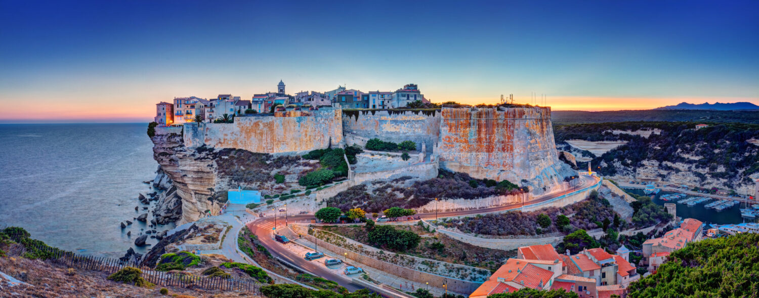 Sunset over Bonifacio, Corsica – region served by air ambulance and medical repatriation to the UK