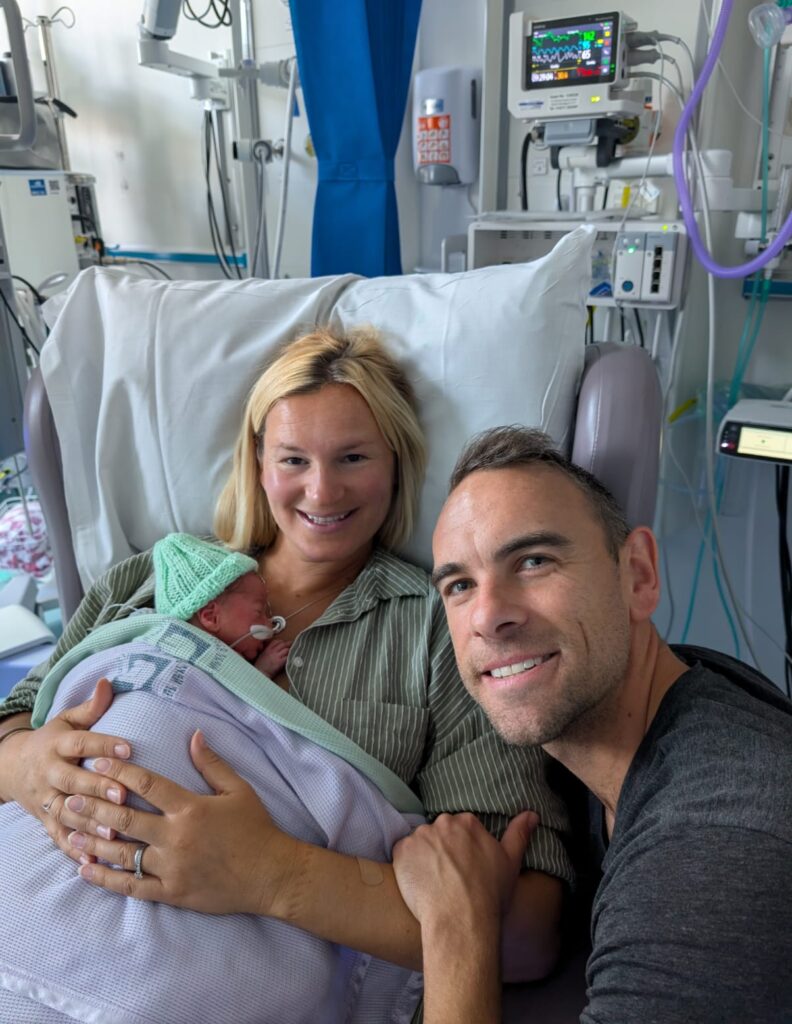 Newborn baby Rio with parents after successful neonatal transfer