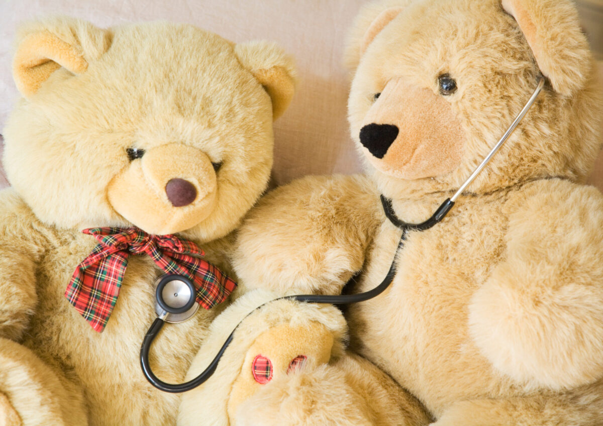 Paediatric air ambulance team caring for a child during a medical repatriation flight
