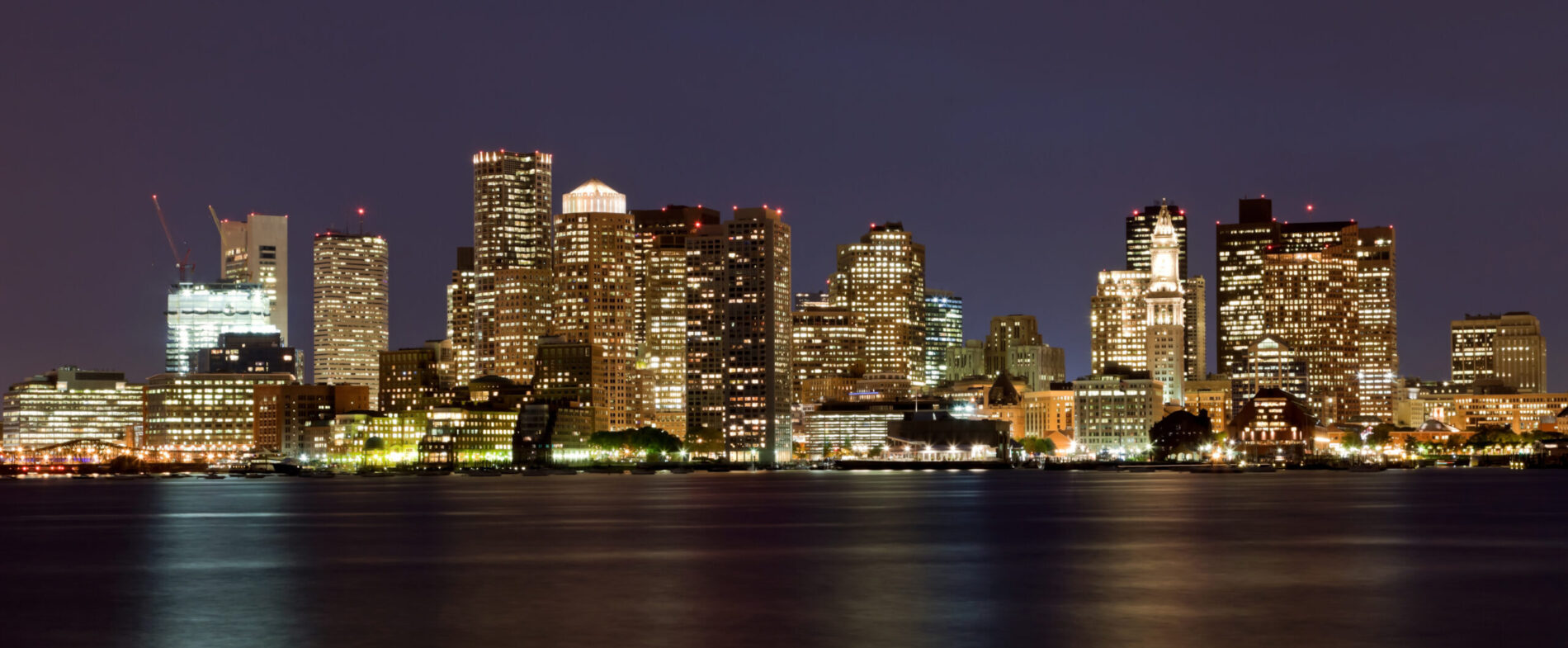 Boston skyline at night, used for air ambulance and medical repatriation services from Boston to the UK