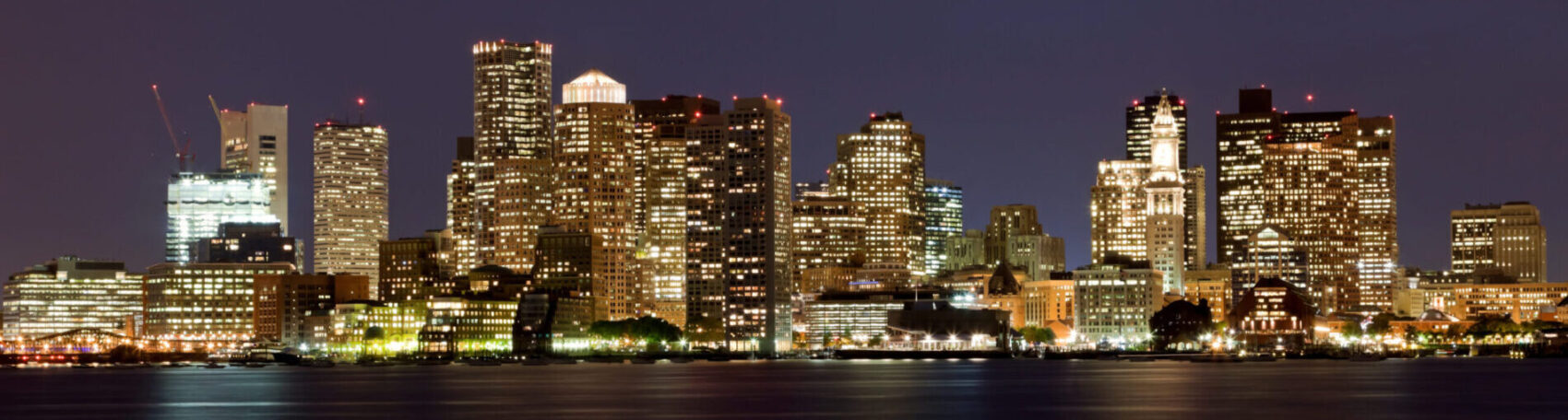 Boston skyline at night, used for air ambulance and medical repatriation services from Boston to the UK