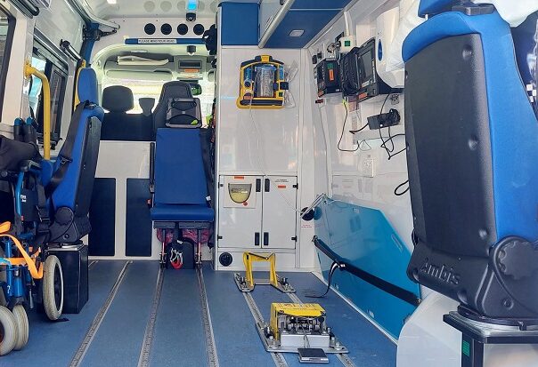 UK ICU ambulance with critical care team and life-support equipment for intensive patient transfers 
