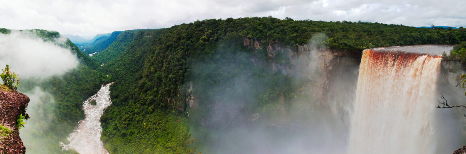 Air ambulance flying over Kaieteur Falls in Guyana during a medical evacuation