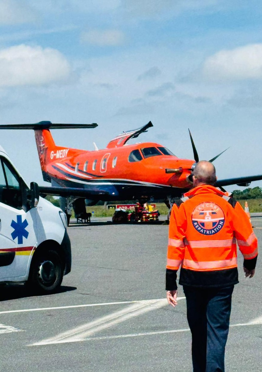 Interior of a medical flight from Tenerife with patient receiving in-flight care from SkyCare medical escort