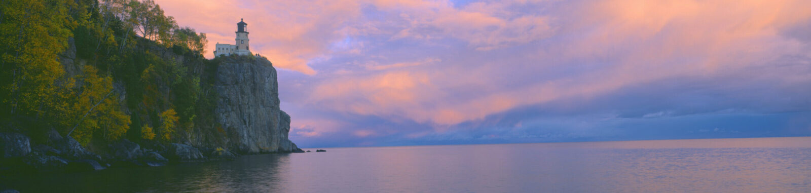 Split Rock Lighthouse on Lake Superior, Michigan, representing air ambulance and medical repatriation services.